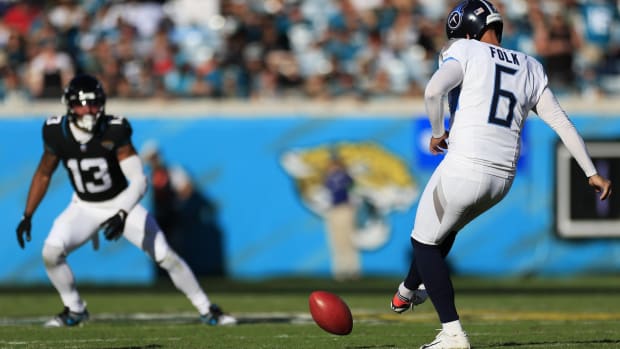 Tennessee Titans kicker Nick Folk attempts an onside kick in a game vs. the Jacksonville Jaguars.